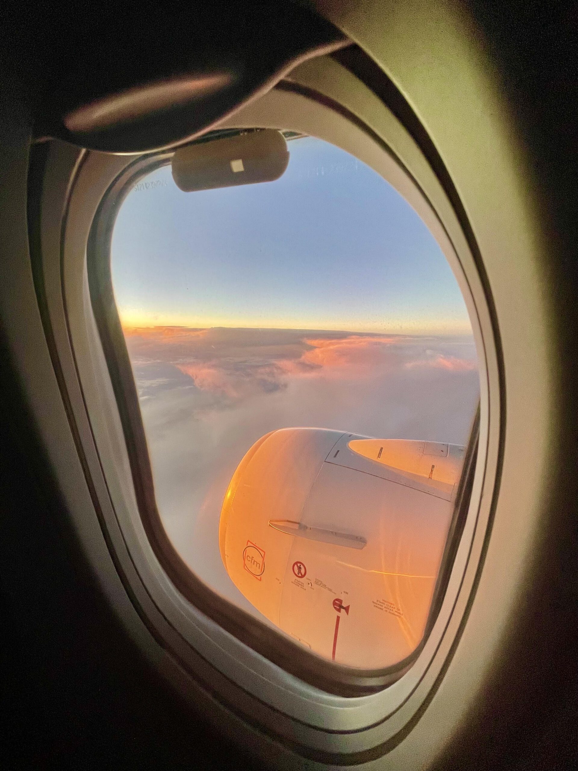 Beautiful sunrise seen from a window during travel
