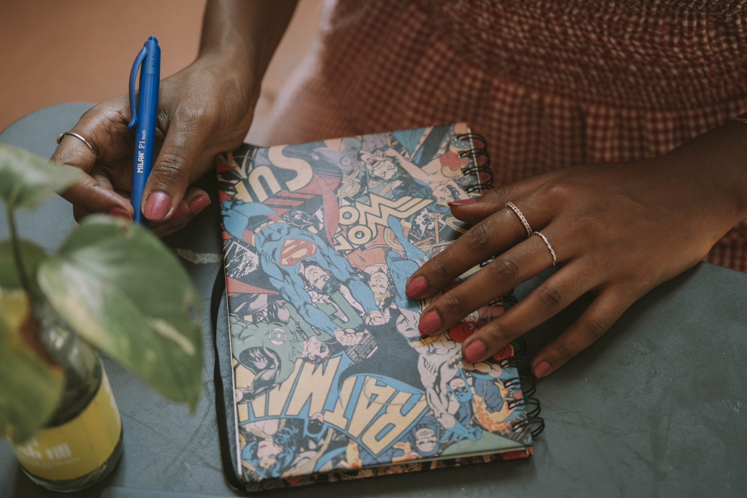 Solo female traveler documenting her journey in a travel journal abroad