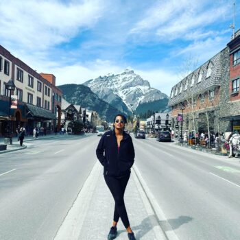 Solo female traveler exploring scenic landscapes in Canada