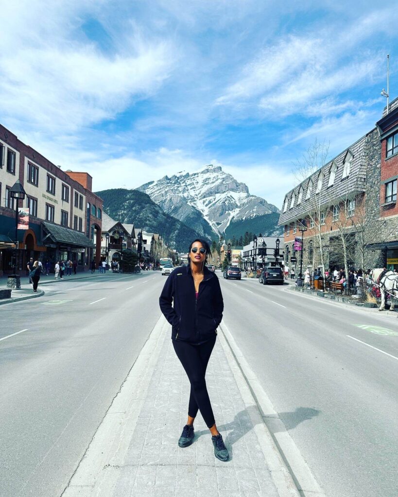 Solo female traveler exploring scenic landscapes in Canada
