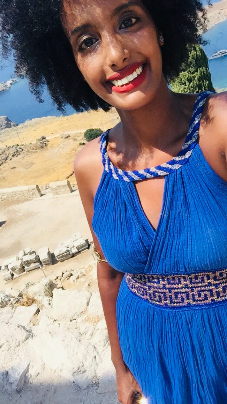 Solo female traveler enjoying Greek island beaches