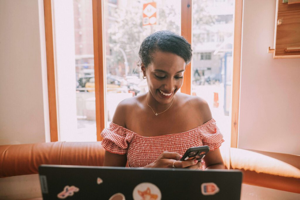 solo female traveler using travel apps for navigation