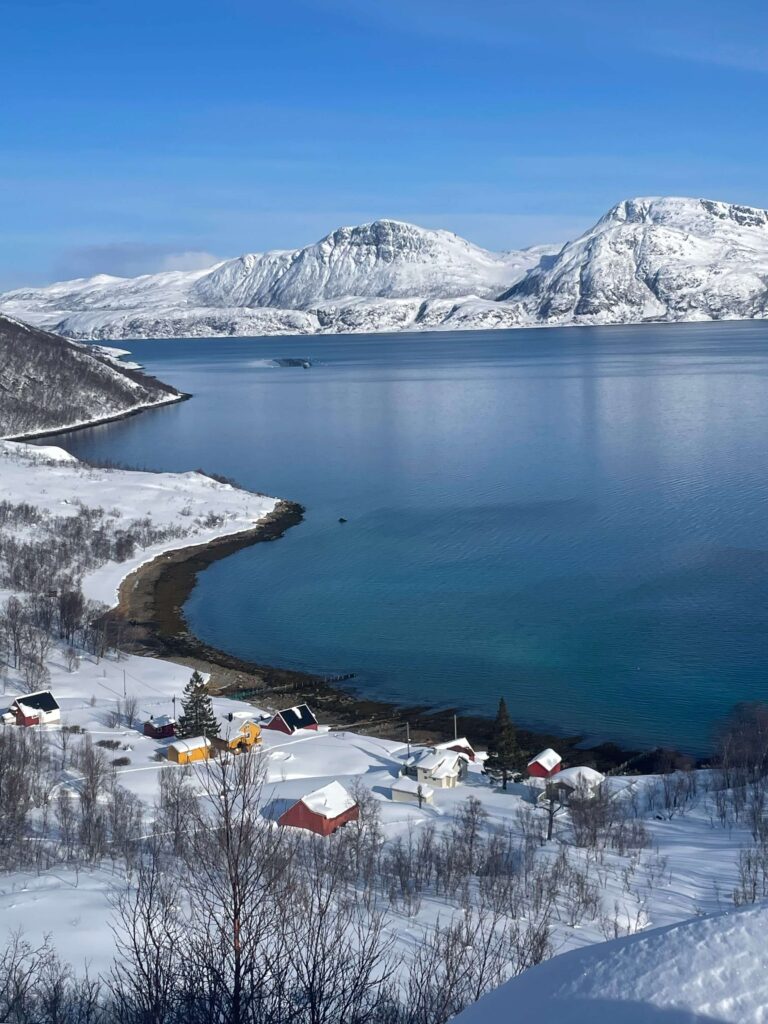 Snow-covered mountains in Norway during winter, scenic travel destination for solo female travelers