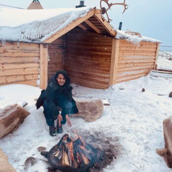 Solo female traveler hiking in Norwegian fjords