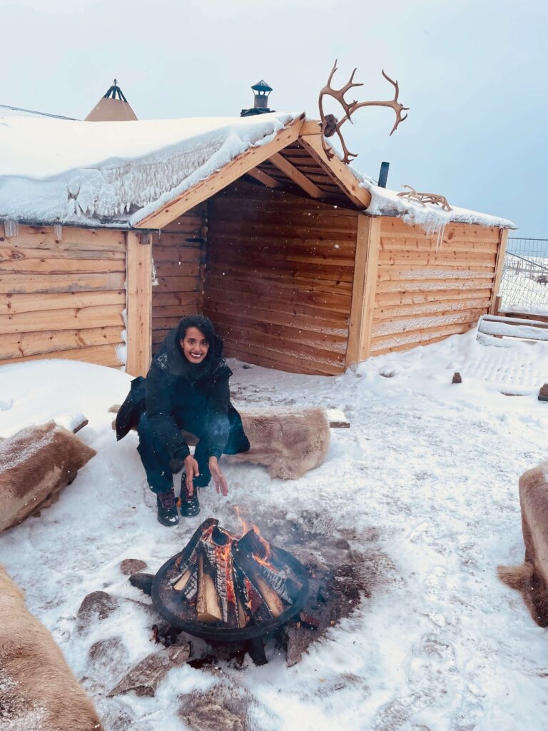 Solo female traveler hiking in Norwegian fjords