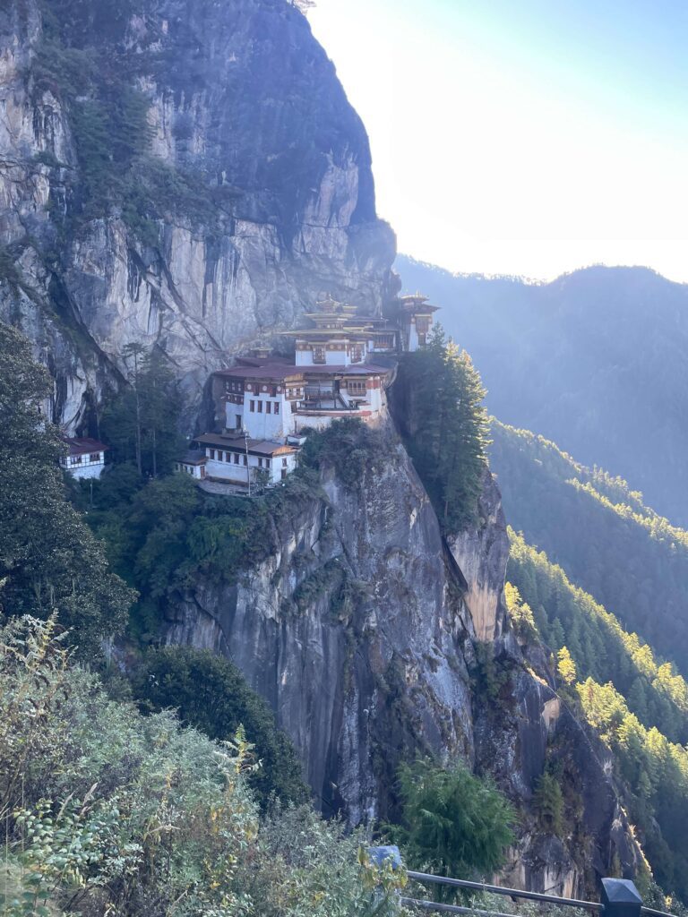Solo female traveler hiking to Tigers’ Nest monastery in Bhutan