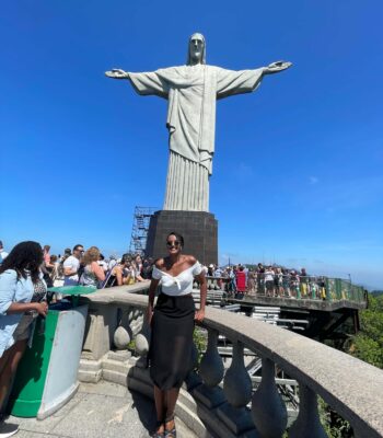 Solo female traveler exploring Rio de Janeiro in Brazil, walking and enjoying the cityscape and travel atmosphere