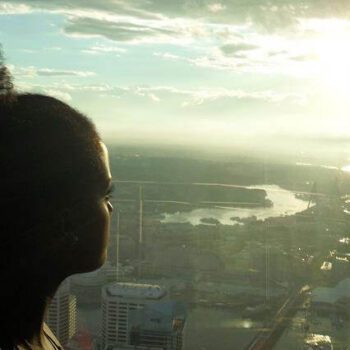 solo female traveler exploring Sydney Opera House in Australia