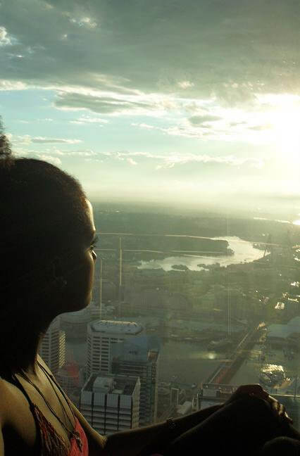 solo female traveler exploring Sydney Opera House in Australia