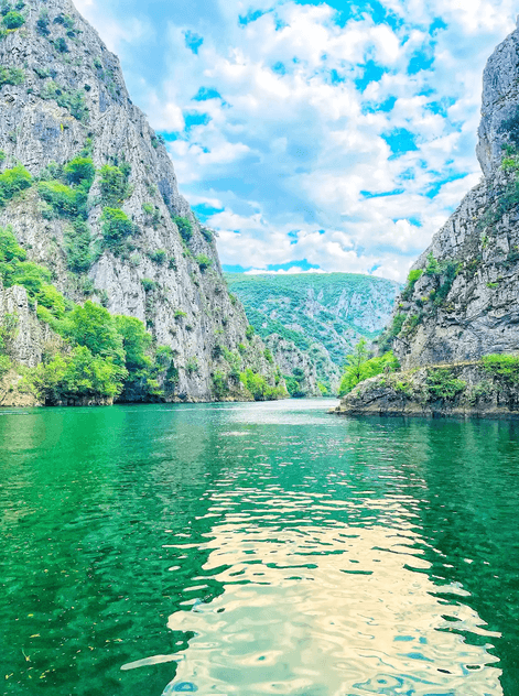 Solo female traveler kayaking in Matka Canyon, North Macedonia