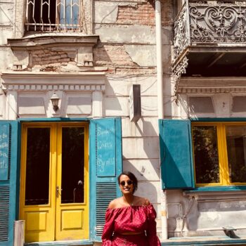 Solo female traveler walking through Old Town Tbilisi in Georgia