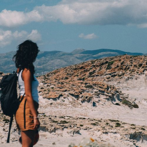 Solo female traveler exploring the Outback on a hiking adventure in Australia