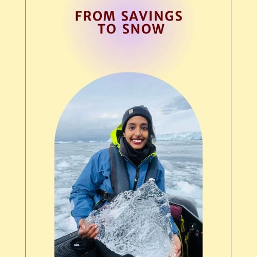 Solo female traveler reading Antarctica guide ebook to save money on expedition