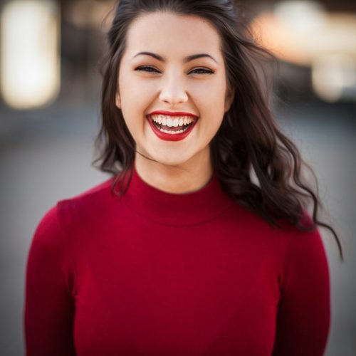 Solo female traveler enjoying her first solo travel experience